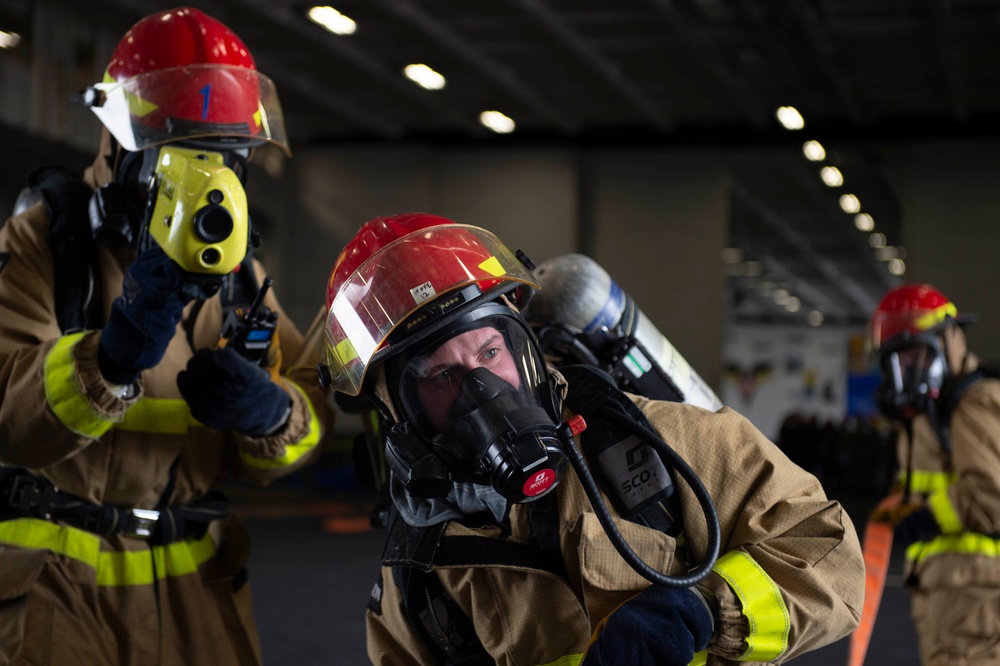 Sailors participate in General Quarters aboard USS Carl Vinson (CVN 70)