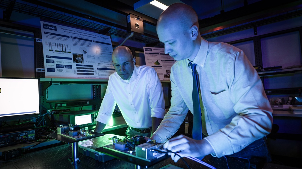 Steven Arbogast (left) and Jacob Hall conduct signal analysis at 340 GHz radio frequency.