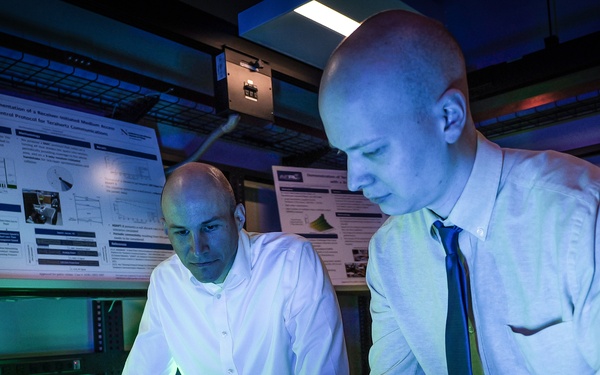 Steven Arbogast (left) and Jacob Hall conduct signal analysis at 340 GHz radio frequency.