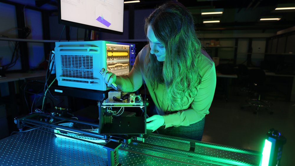 Clair Parisi measures channel impulse response at 140 GHz. AFRL is leading the area of wireless communications in underutilized parts of radio spectrum