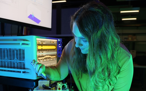 Clair Parisi measures channel impulse response at 140 GHz. AFRL is leading the area of wireless communications in underutilized parts of radio spectrum