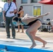 Army Reserve 1st Lt. Brianna Mirmina dives into a pool