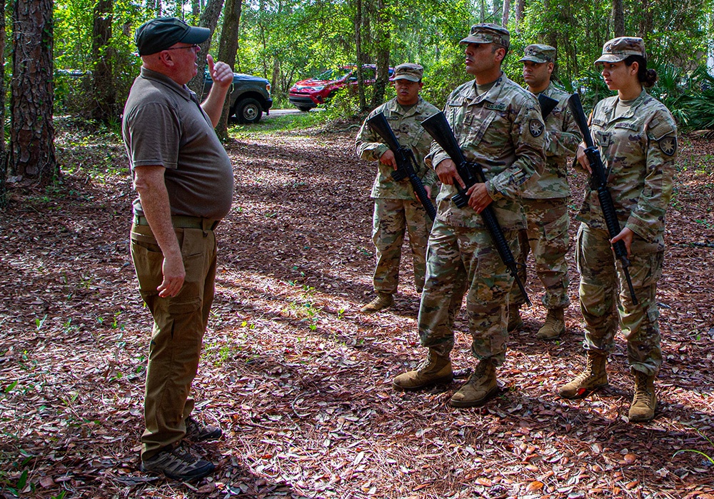 50th Regional Support Group HHC Soldiers conduct base defense training during AT
