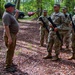 50th Regional Support Group HHC Soldiers conduct base defense training during AT