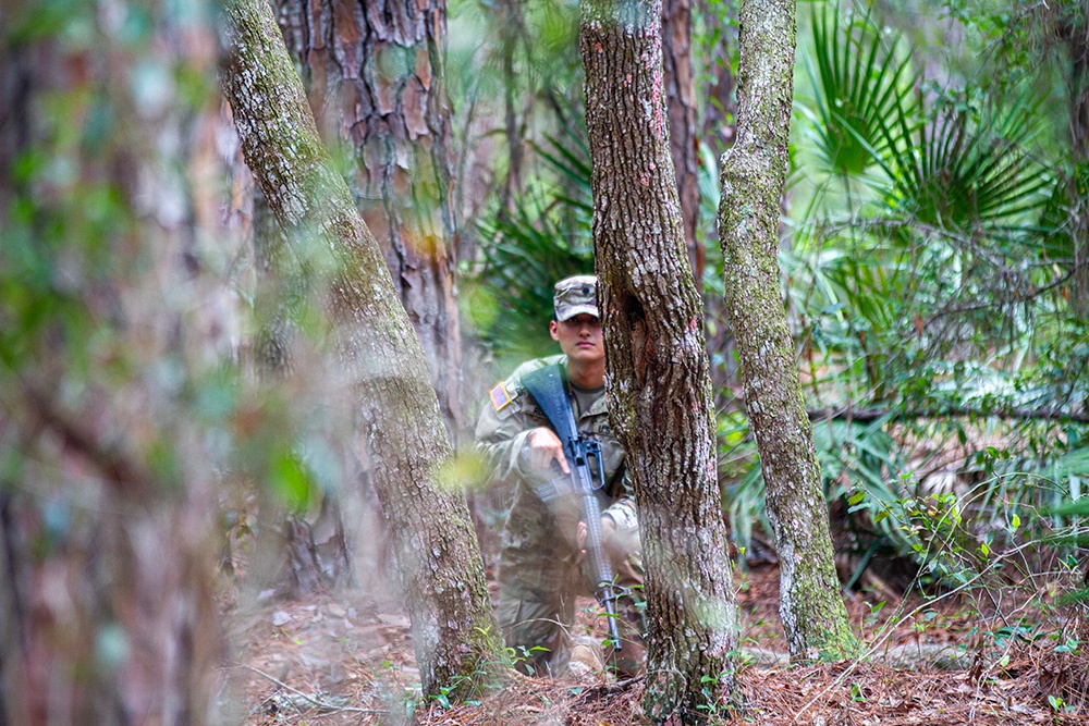 50th Regional Support Group HHC Soldiers conduct base defense training during AT