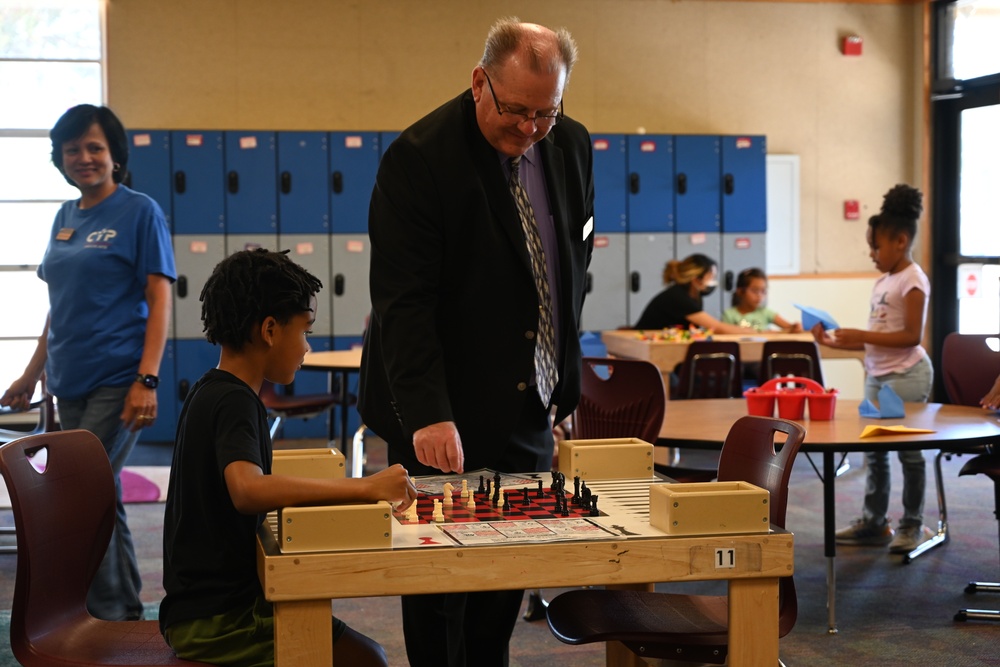 Local school officials visit Travis