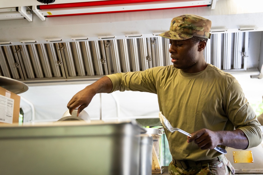 Army National Guard company evaluated in field feeding competition