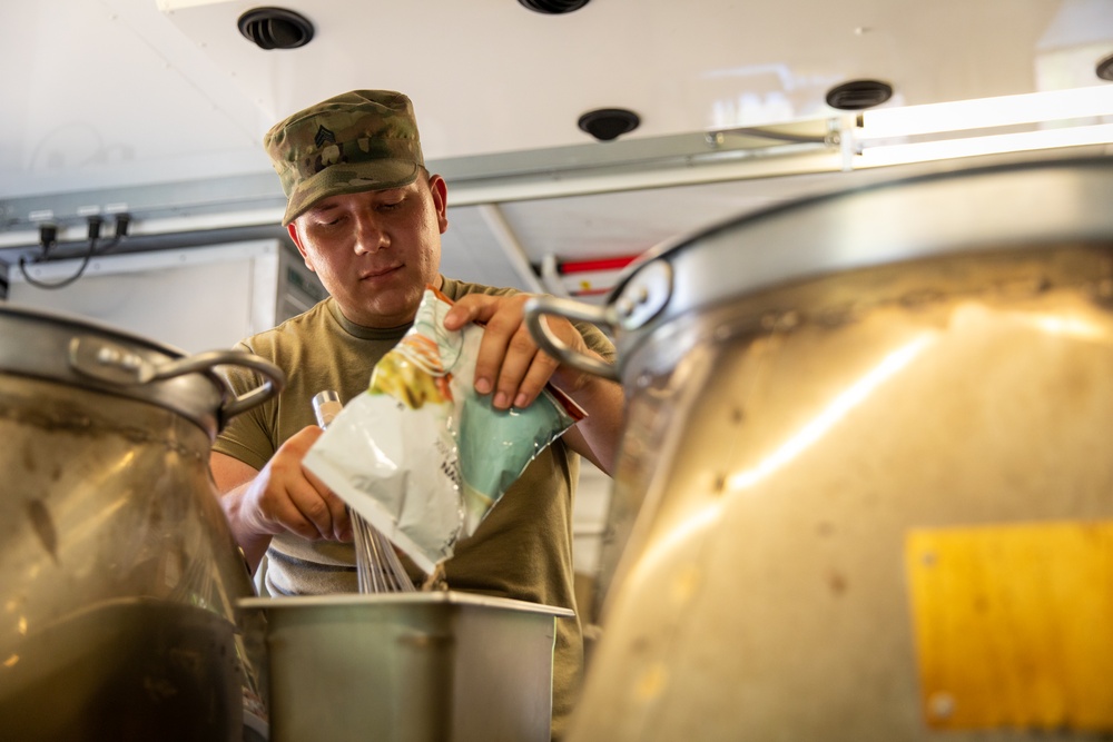 Army National Guard company evaluated in field feeding competition