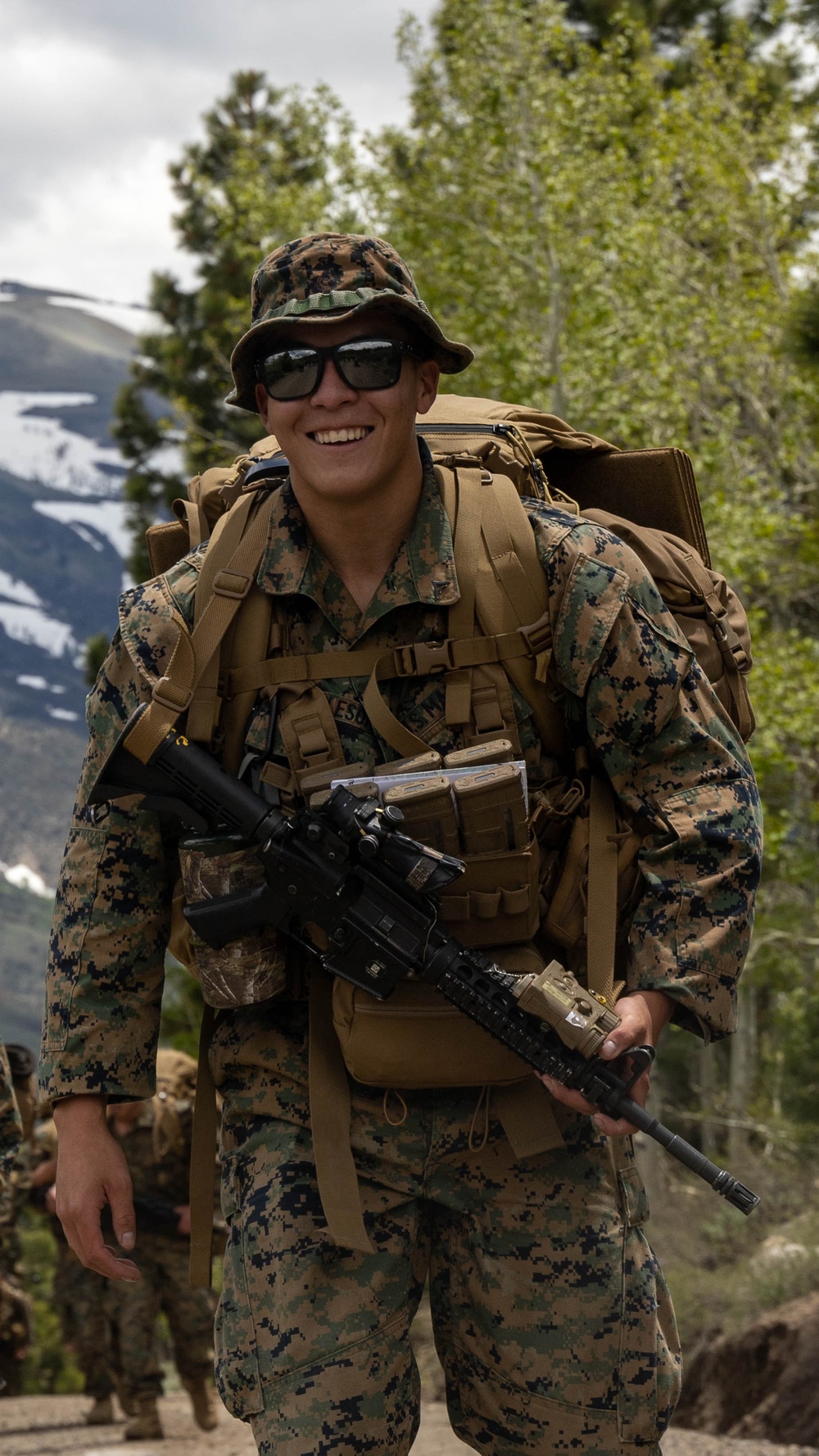 Marines with 2/23 conduct a conditioning hike during MTX 4-23