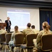 Lee Ellis speaks to Fairchild Airmen