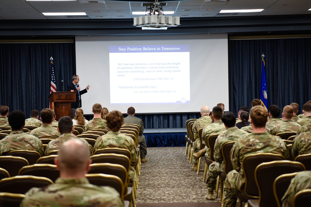 Lee Ellis speaks to Fairchild Airmen
