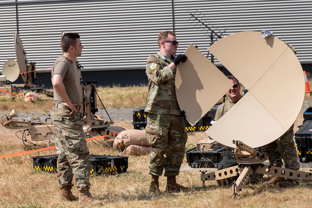 U.S. Airmen set up an Airbus Ranger long haul communications satellite at Air Defender 2023