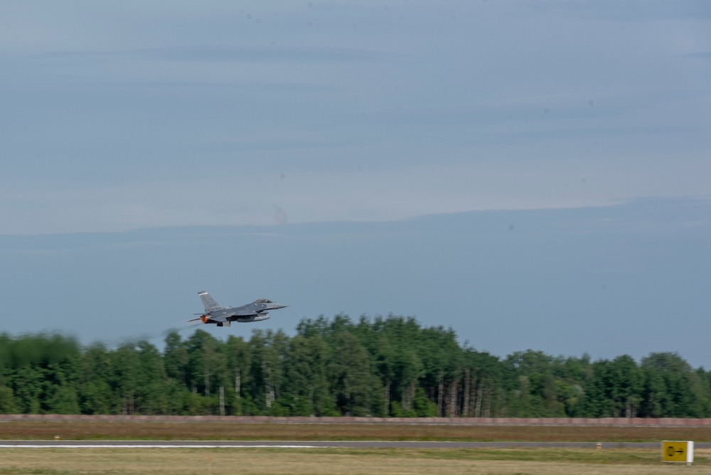 A U.S. Air Force F-16 Fighting Falcon aircraft, 140th Fighter Wing, takes off in Lithuania during exercise Air Defender 2023