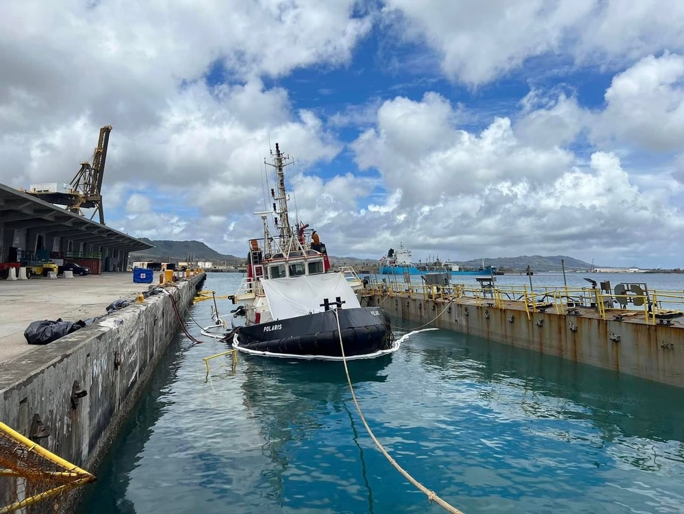 U.S. Coast Guard monitors the refloat of the tug Polaris