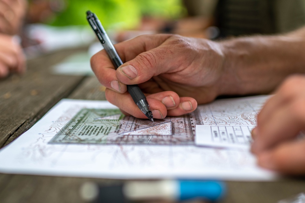 Air Force Reserve Lt. Col. Beau Suder plots points