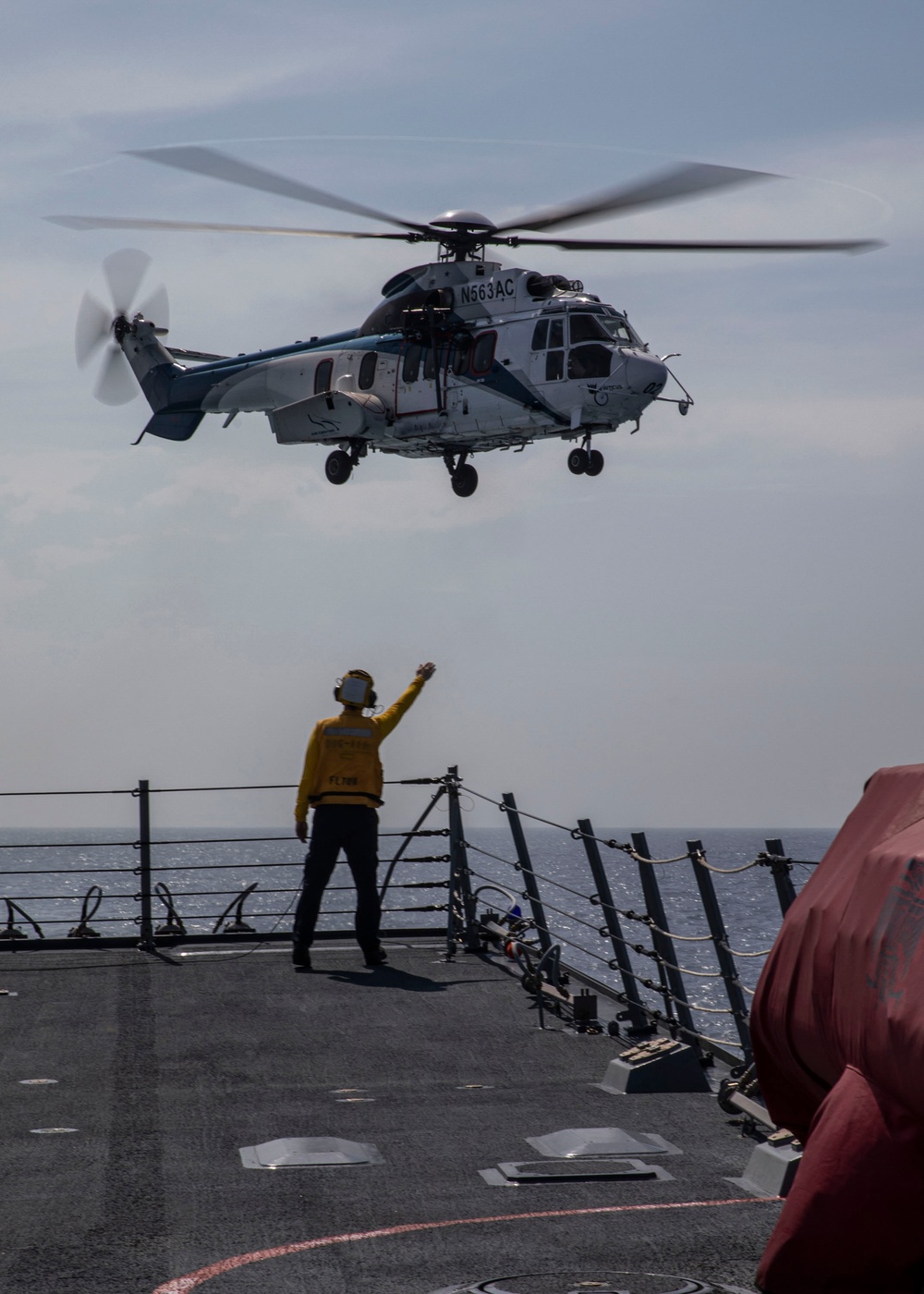 USS Rafael Peralta (DDG 115) hosts the Philippines Navy during a VERTREP