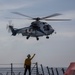 USS Rafael Peralta (DDG 115) hosts the Philippines Navy during a VERTREP