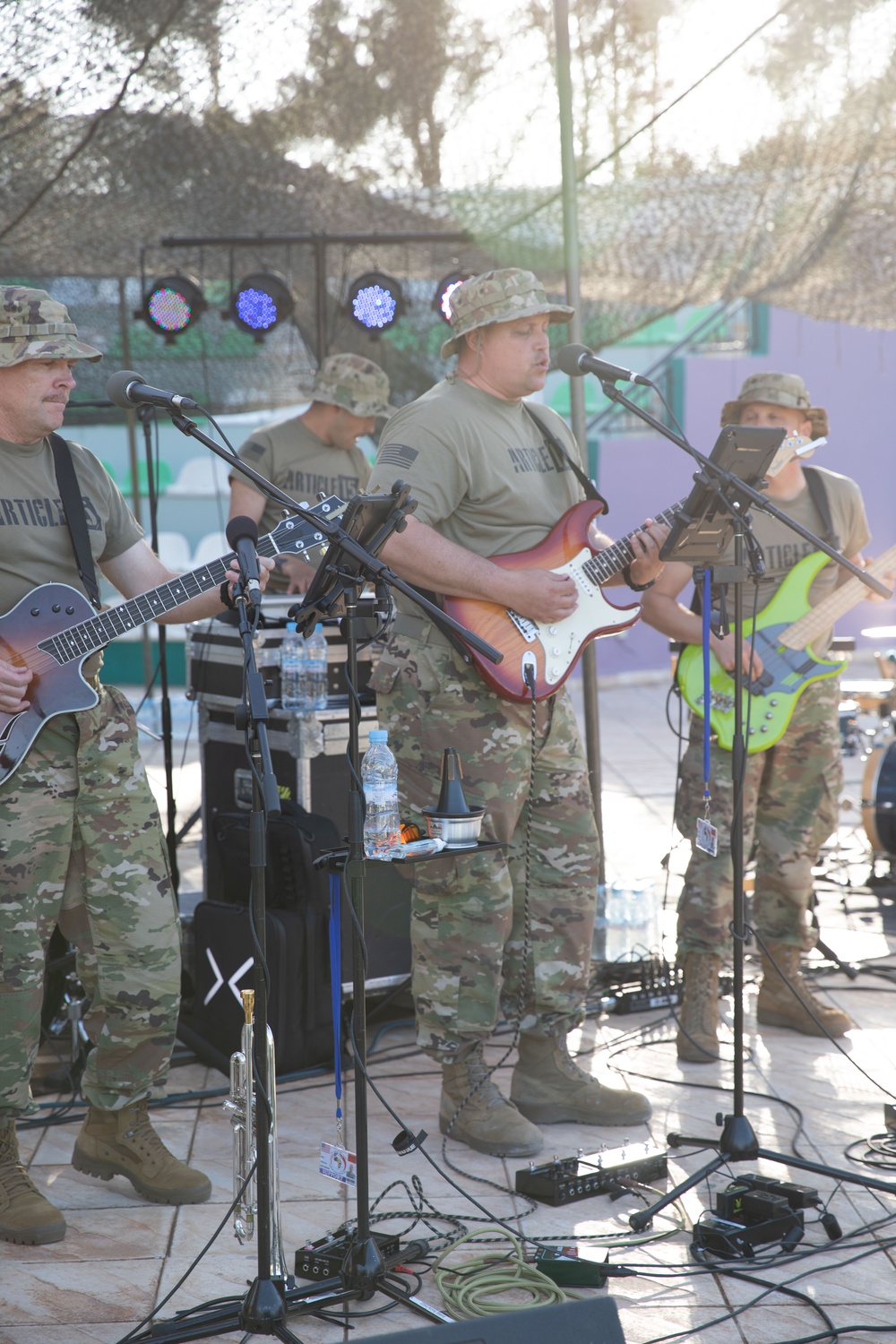 Soldiers from the U.S. Army, 23rd Utah Army National Guard band perform for members of a mult-national military audience