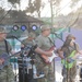 Soldiers from the U.S. Army, 23rd Utah Army National Guard band perform for members of a mult-national military audience