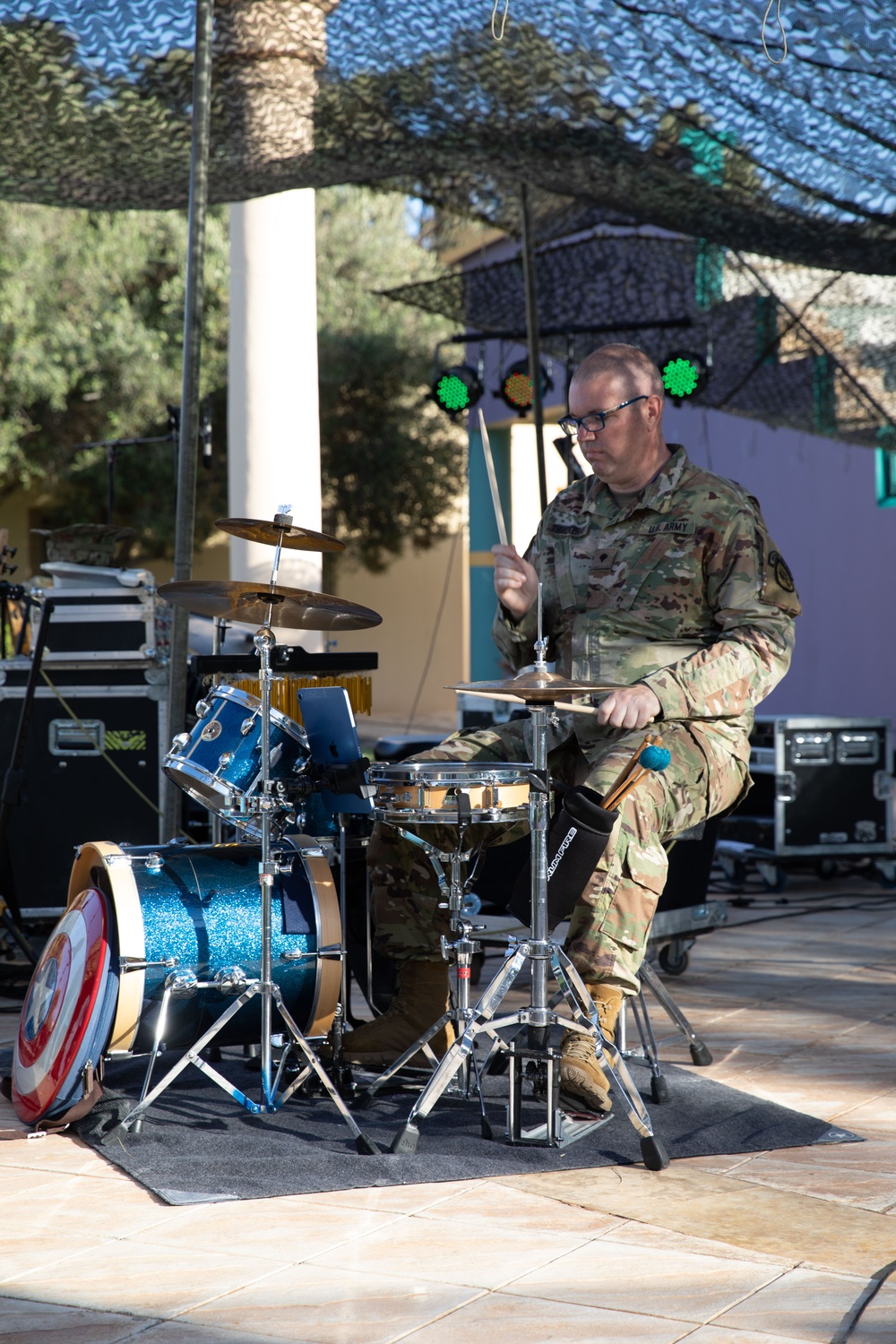 Soldiers from the U.S. Army, 23rd Utah Army National Guard band perform for members of a mult-national military audience