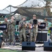 Soldiers from the U.S. Army, 23rd Utah Army National Guard band perform for members of a mult-national military audience