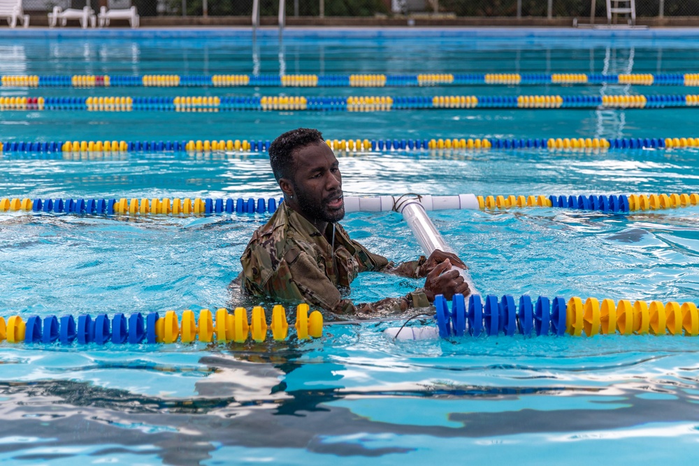 Army Reserve Sgt. Asuerus Thompson completes swimming time-trial