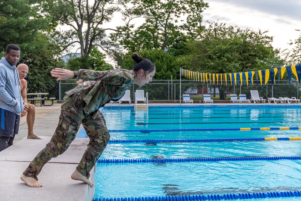 Army Reserve Capt. Joy Petway dives into a pool