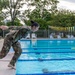 Army Reserve Capt. Joy Petway dives into a pool