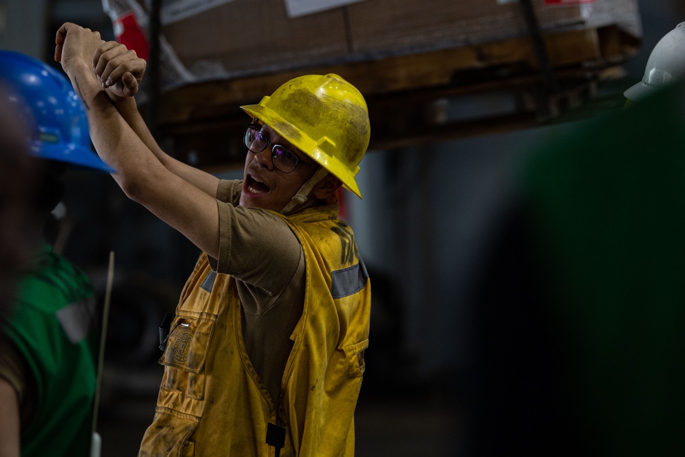 USS Ronald Reagan (CVN 76) conducts replenishment-at-sea with USNS Carl Brashear