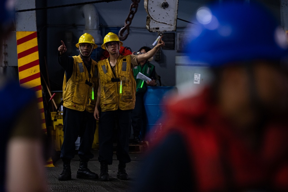 USS Ronald Reagan (CVN 76) conducts replenishment-at-sea with USNS Carl Brashear