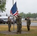 A Michigan National Guard flag detail brings down the Nation's flag at the TAG Social