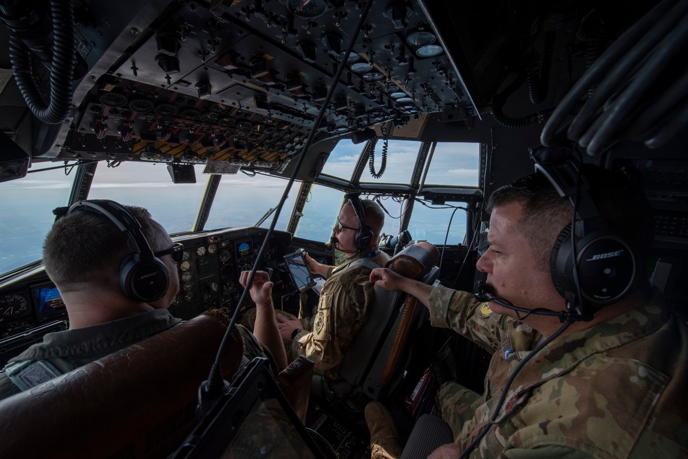 U.S. Airmen, 152nd Airlift Wing and 153rd Airlift Wing, complete a C-130 Hercules cargo drop