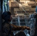 U.S. Airmen, 152nd Airlift Wing and 153rd Airlift Wing, complete a C-130 Hercules cargo drop