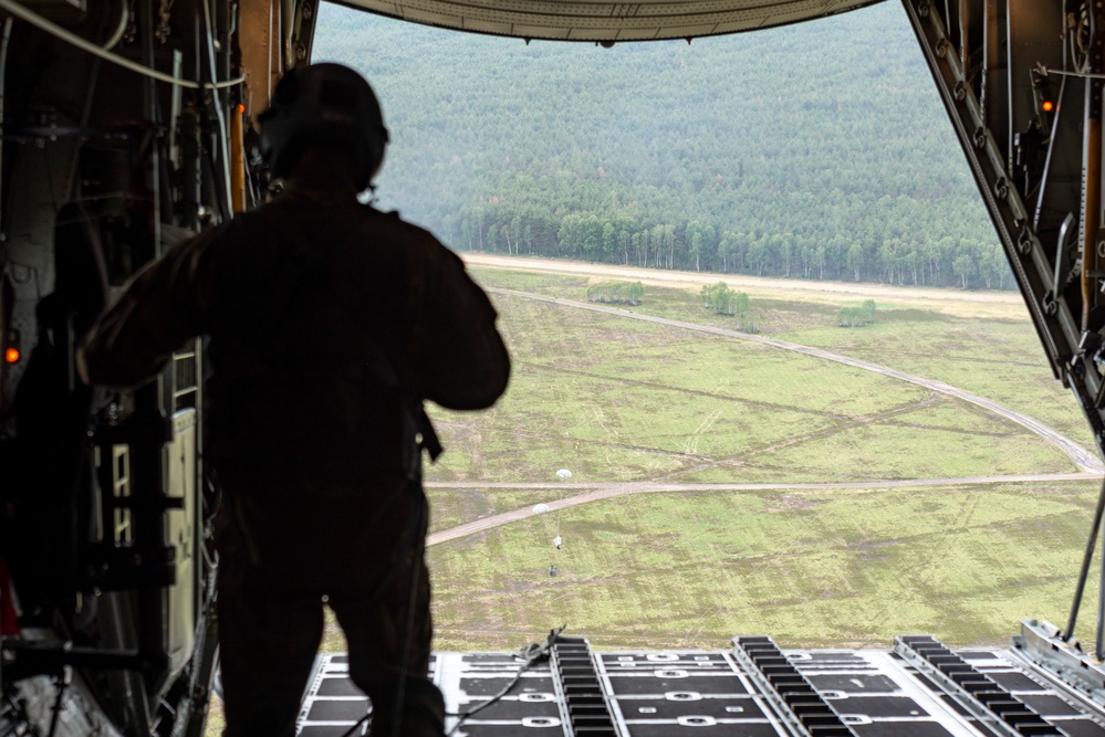 U.S. Airmen, 152nd Airlift Wing and 153rd Airlift Wing, complete a C-130 Hercules cargo drop