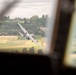 U.S. Airmen, 152nd Airlift Wing and 153rd Airlift Wing, complete a C-130 Hercules cargo drop