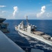 USS Ronald Reagan (CVN 76) conducts fueling-at-sea with USS Robert Smalls (CG 62)