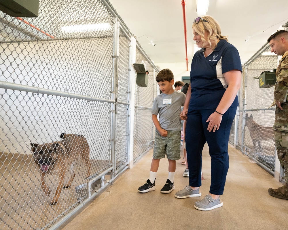 Honorary Commanders, children tour Dover AFB during Bring Your Kids to Work Day
