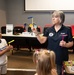 Honorary Commanders, children tour Dover AFB during Bring Your Kids to Work Day