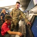 Honorary Commanders, children tour Dover AFB during Bring Your Kids to Work Day