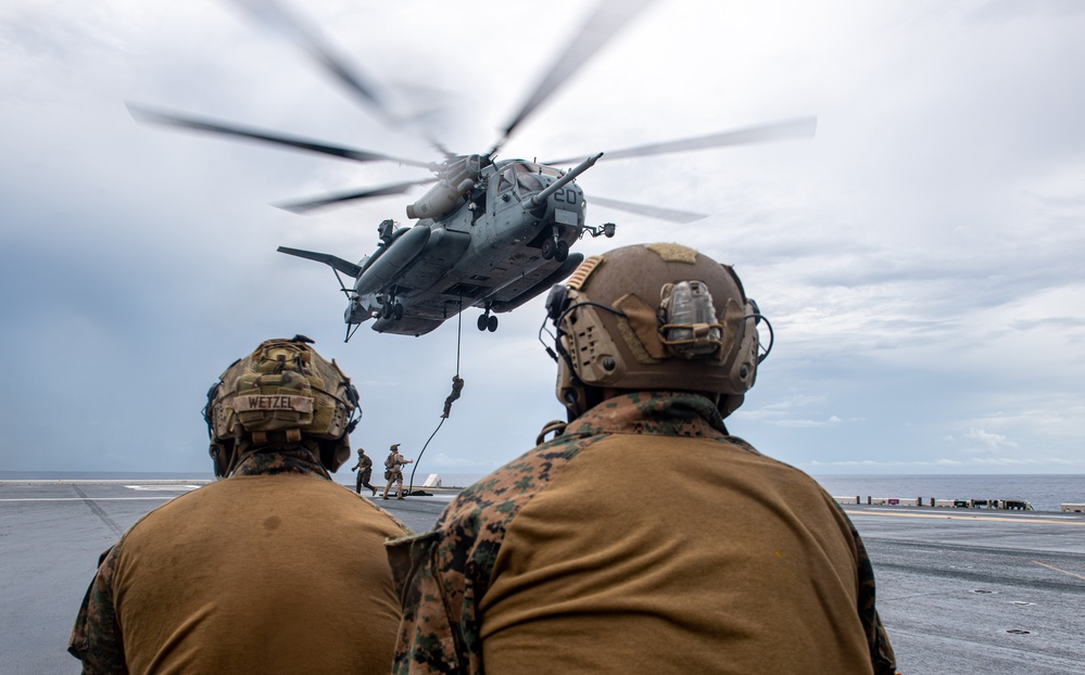 31st MEU Conducts a Fast Rope Exercise On the Flight Deck of USS America