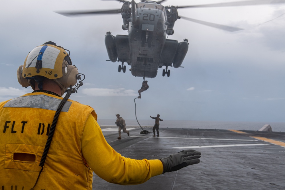 31st MEU Conducts a Fast Rope Exercise On the Flight Deck of USS America