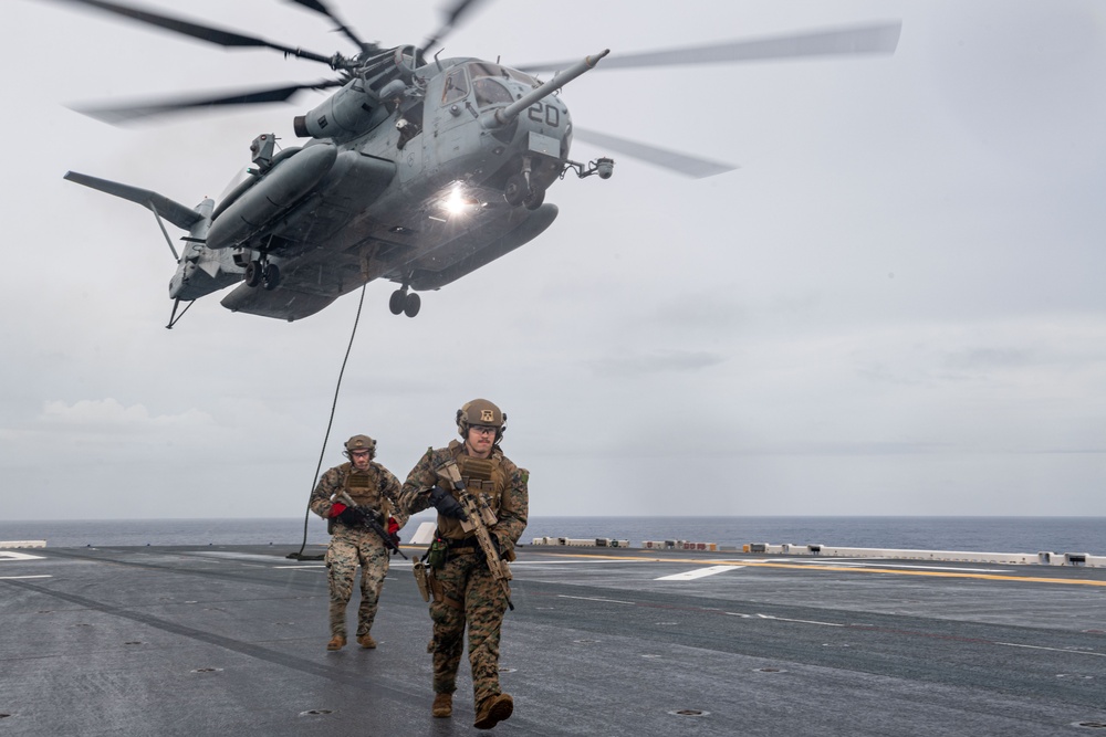 31st MEU Conducts a Fast Rope Exercise On the Flight Deck of USS America