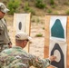 Air Force Reserve Col. Ryan “MZ” Montanez receives pistol training