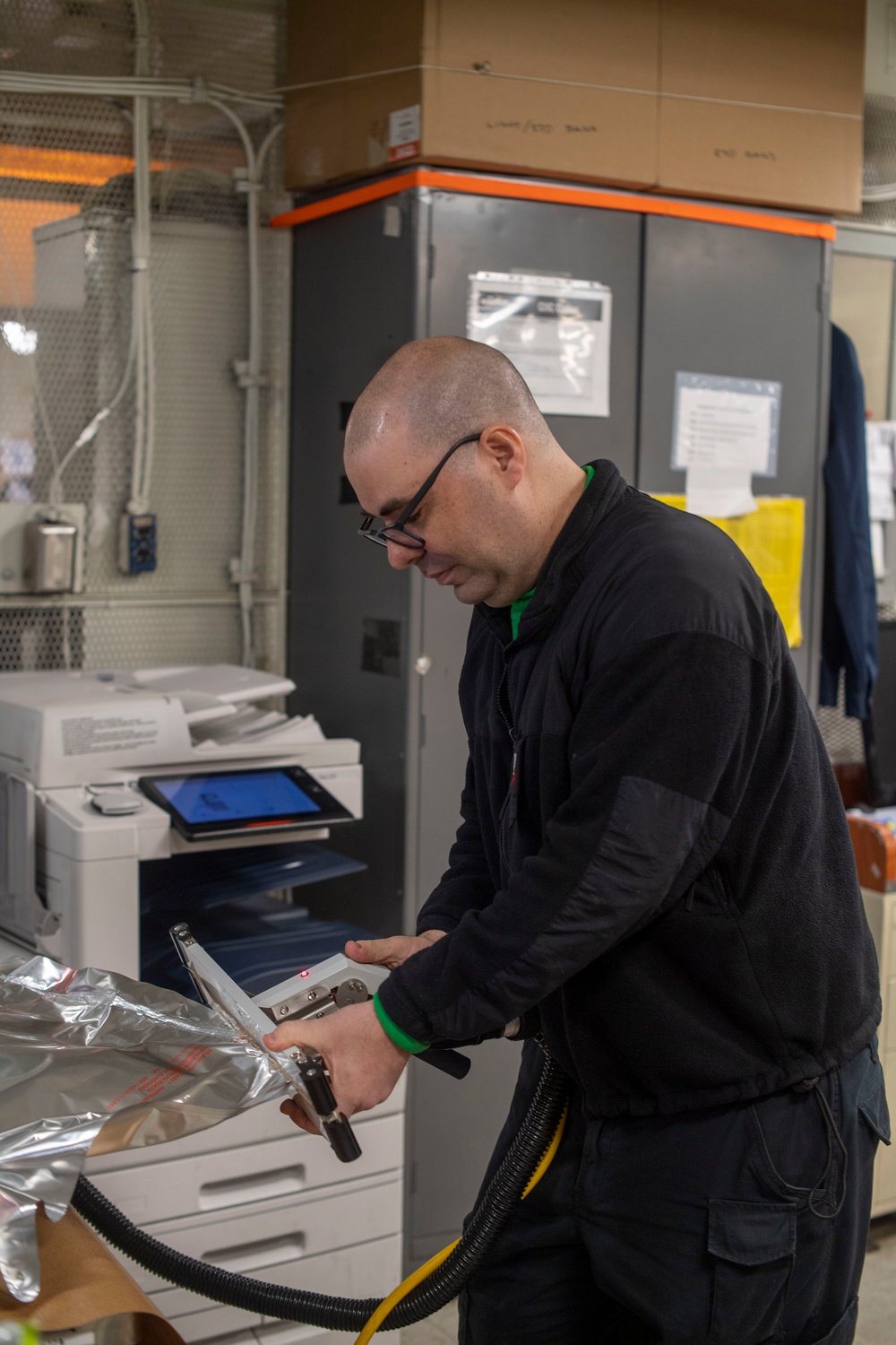 U.S. Navy Sailor Wraps Parts