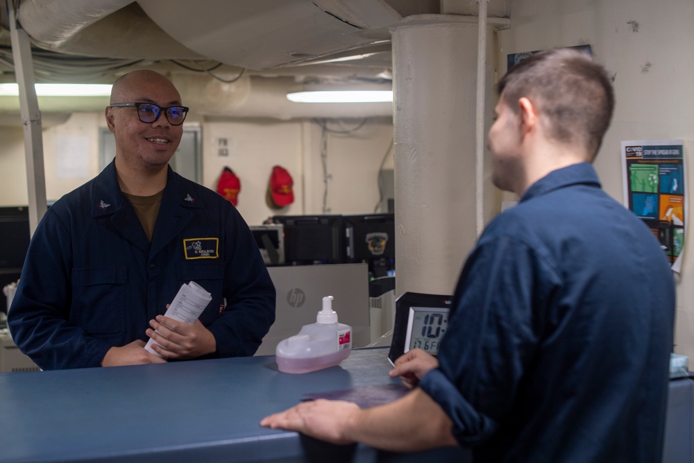 U.S. Navy Sailor Processes Transfer Package