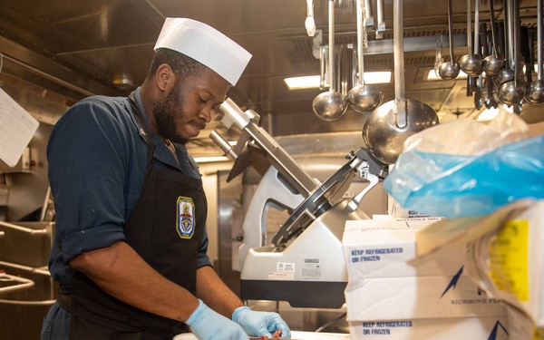 CS2 Hudu Cuts Steak Aboard USS Antietam (CG 54)