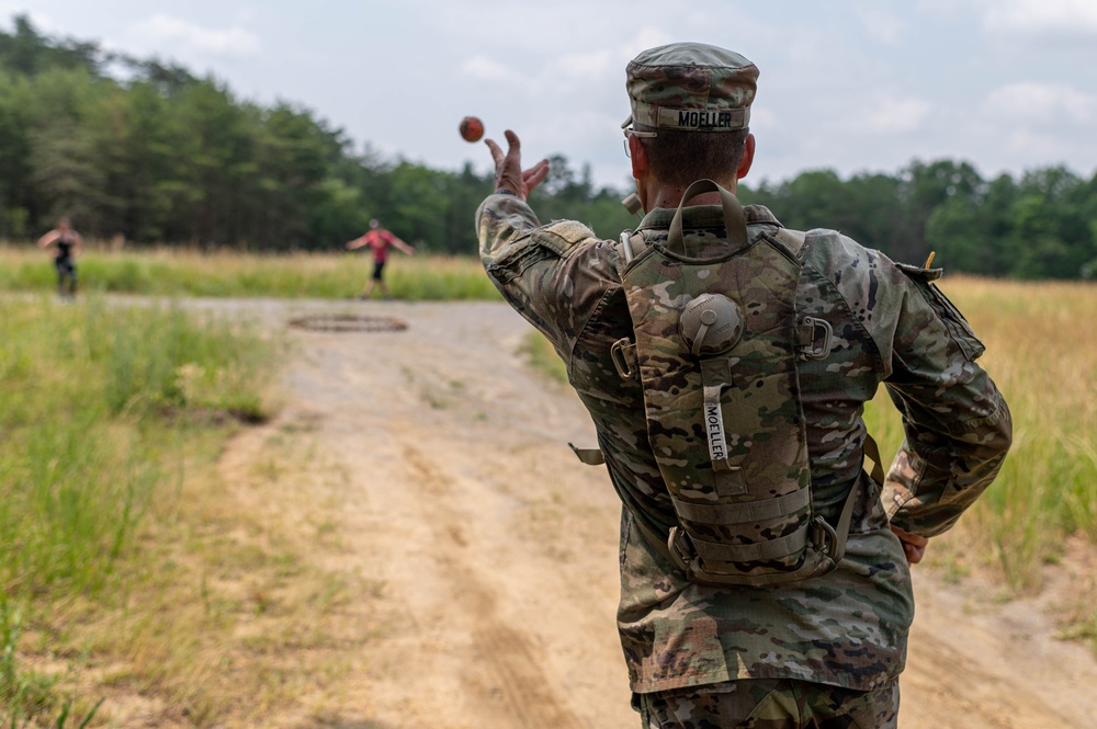 Army Reserve 1st Lt. Joshua Moeller tosses a practice grenade