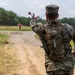 Army Reserve 1st Lt. Joshua Moeller tosses a practice grenade