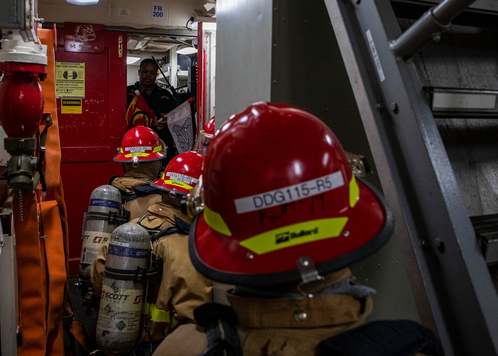 USS Rafael Peralta (DDG 115) conducts a general quarters drill