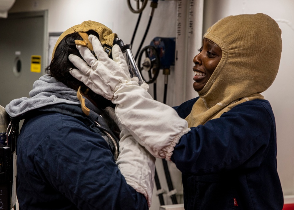 USS Rafael Peralta (DDG 115) conducts a general quarters drill